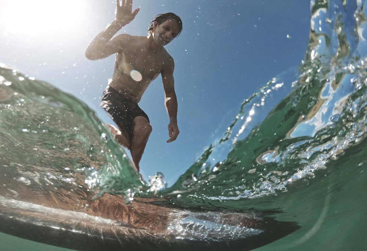 surfing on the Malibu surfboard