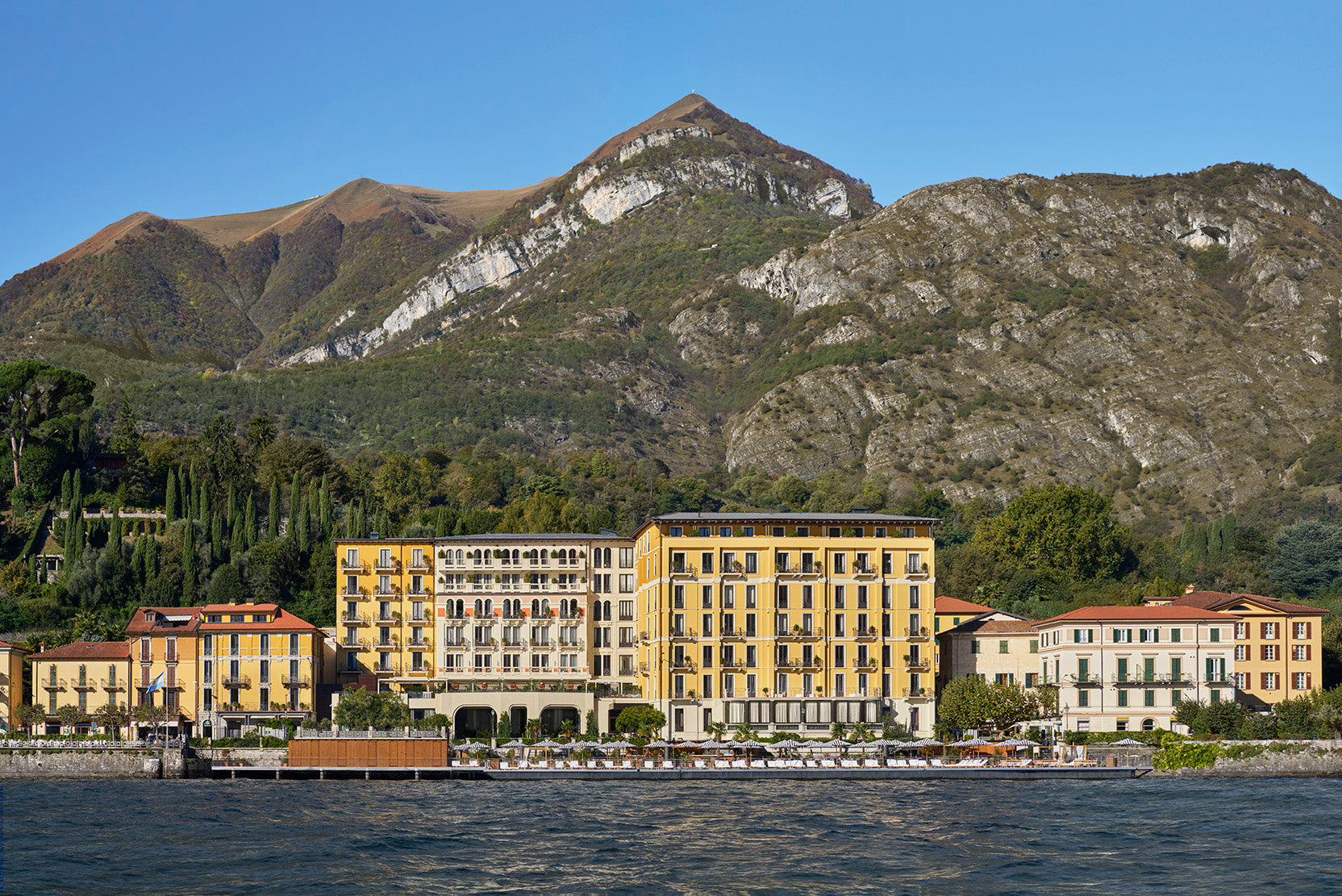 The Lake Como EDITION on the waterfront beneath the mountains