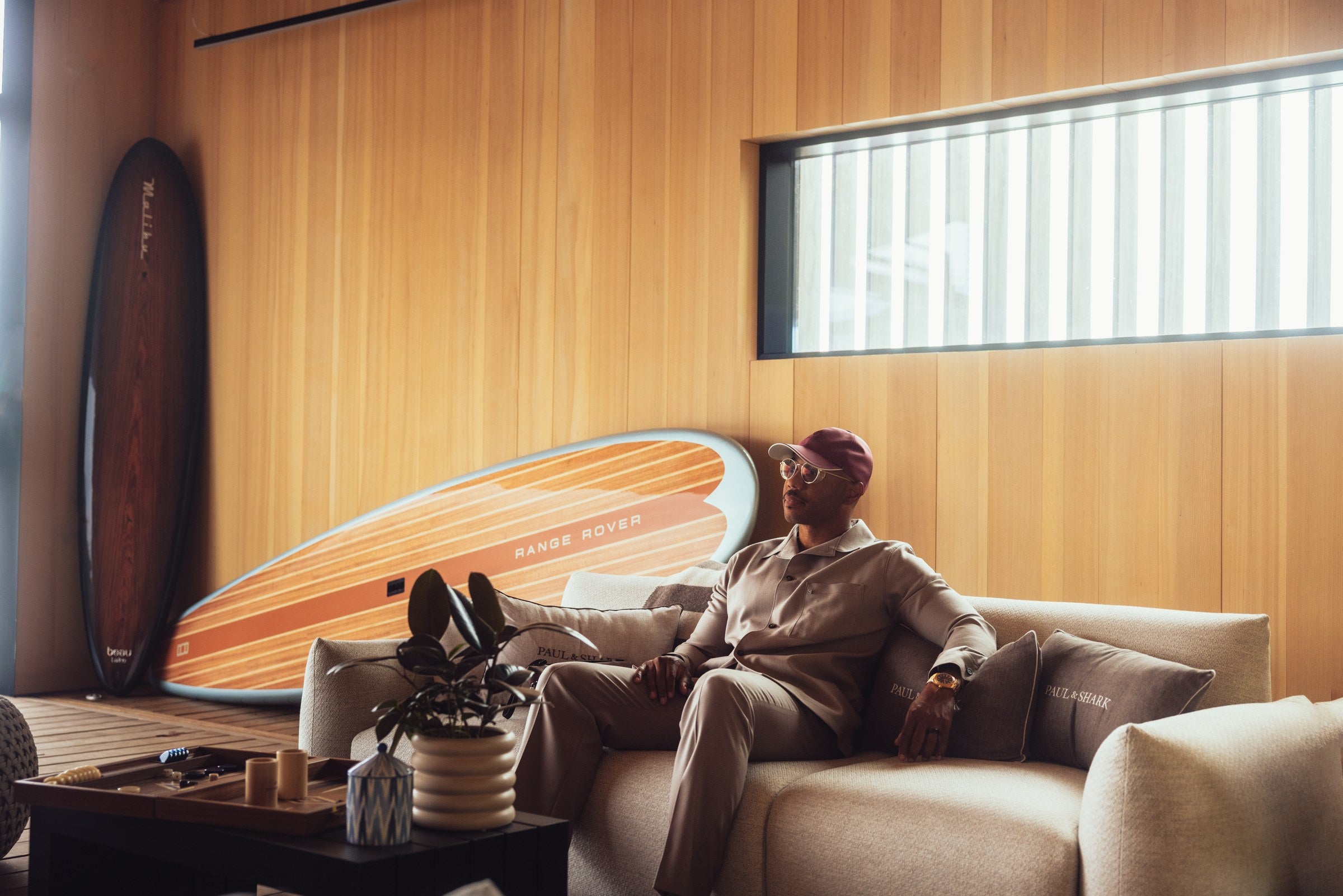 Boathouse lounge with custom Range Rover board